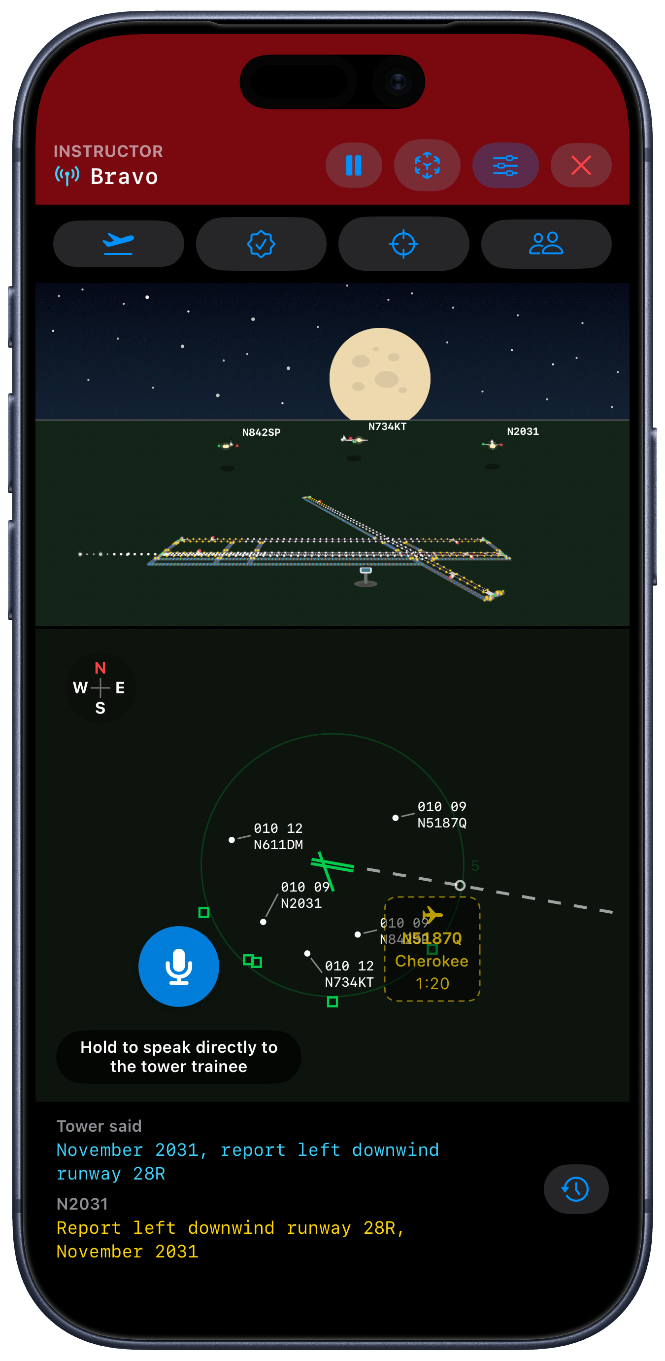 Instructor guiding a live Tower Simulator session at night